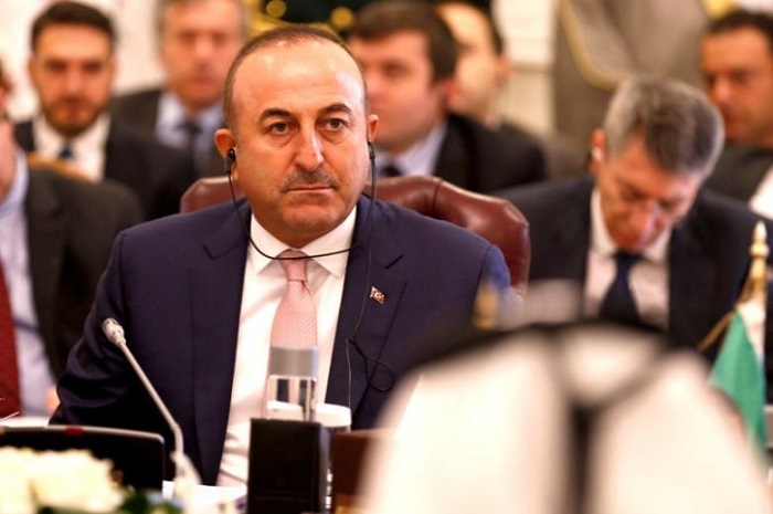 Turkish foreign minister visits Iran, meets Rouhani 